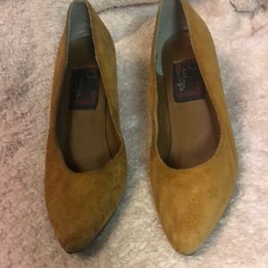 Leather (Suede) upper, balance man-made.Worn once but dirt on side, see photo